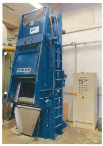 Schlick Muldenband werpstraalmachine (trommelband) met een turbine